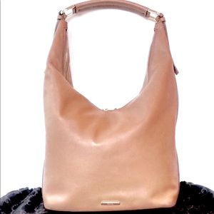 Gucci tan leather hobo handbag.